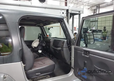 2000 Jeep Wrangler Sport z USA, uszkodzony, nr VIN 1J4FA49S2YP797321